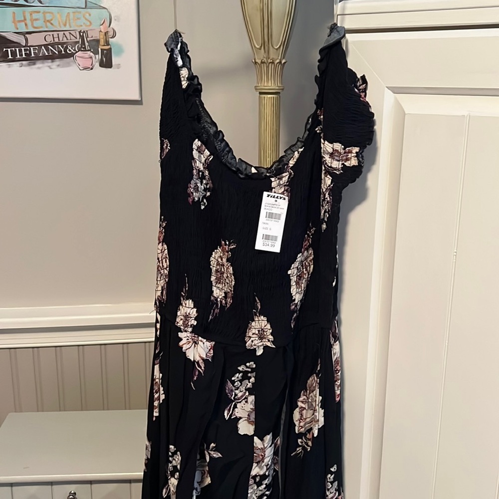New with tags romper with attached skirt